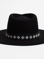 Close-up of black and white Rwandan beaded band on Cairo fedora crown