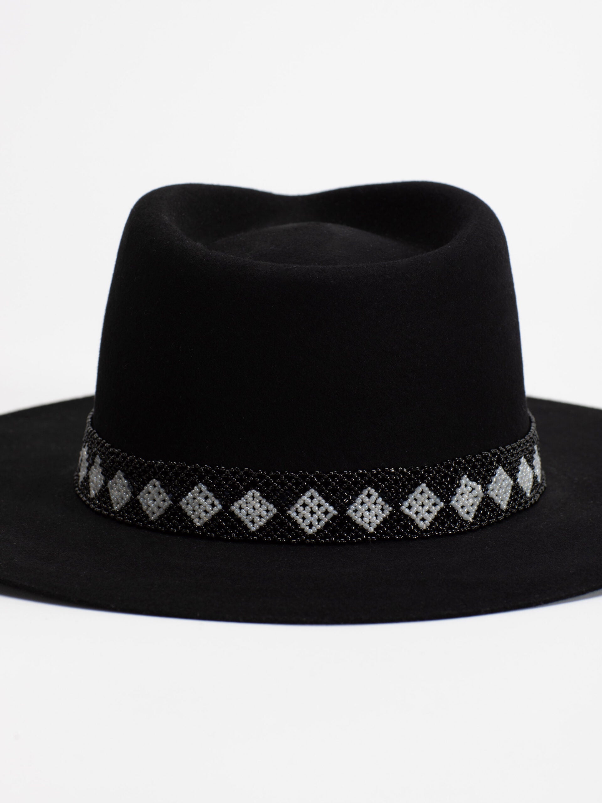 Close-up of black and white Rwandan beaded band on Cairo fedora crown
