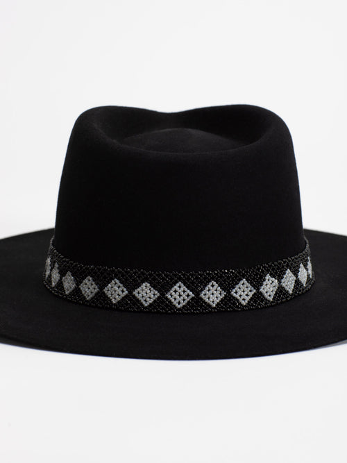 Close-up of black and white Rwandan beaded band on Cairo fedora crown