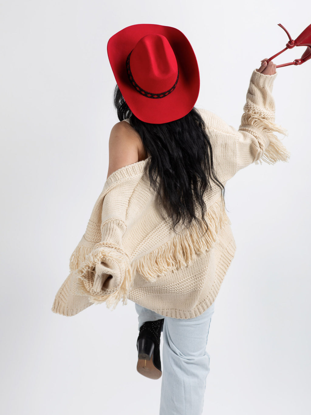 Woman wearing Gasabo handmade cowboy hat