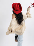 Woman wearing Gasabo handmade cowboy hat