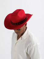Man wearing Gasabo cowboy hat showing Rwandan beadwork
