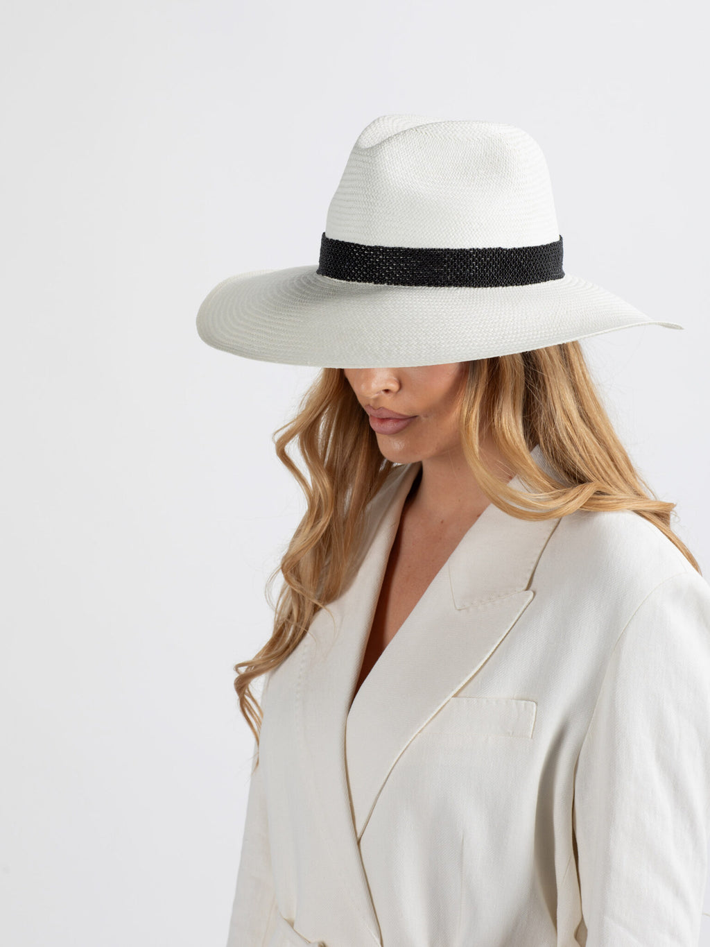 Woman wearing Ibiza handmade Panama straw hat