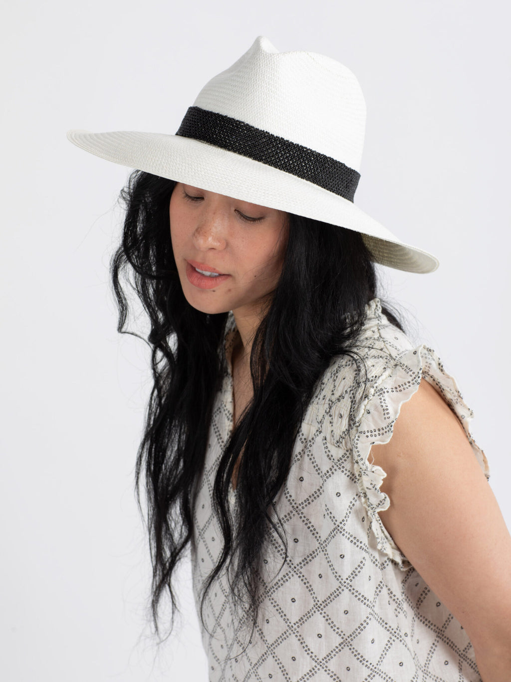 Woman wearing Ibiza handmade Panama straw hat