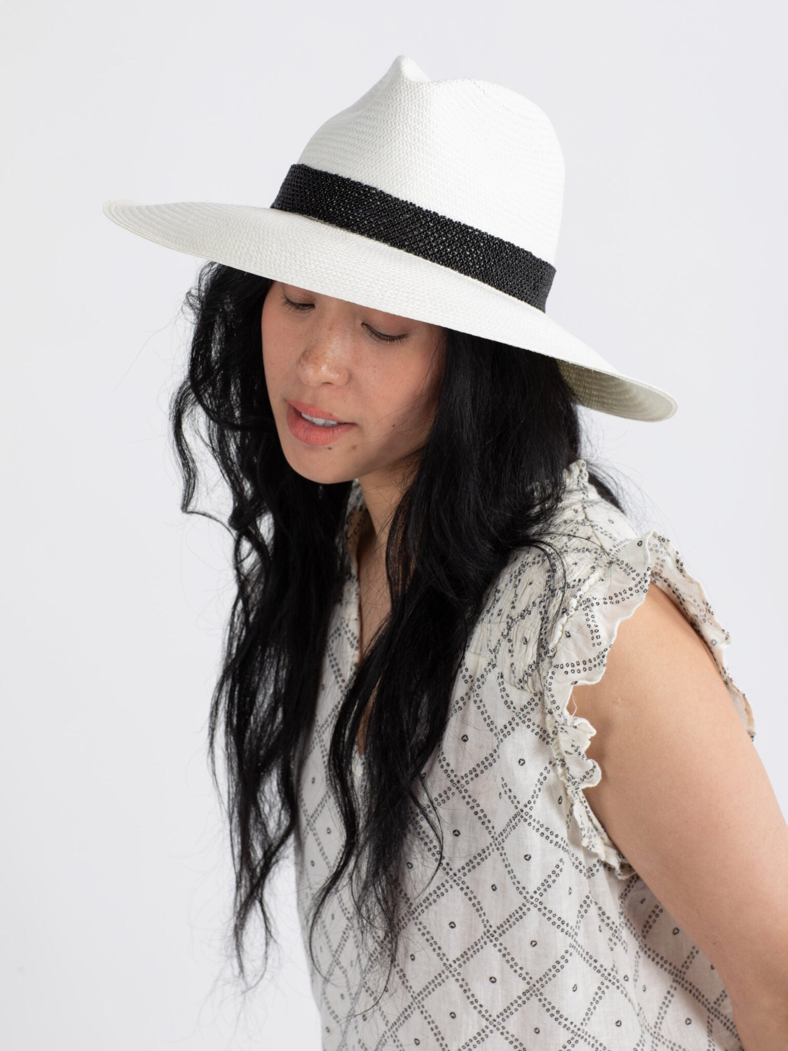 Woman wearing Ibiza handmade Panama straw hat