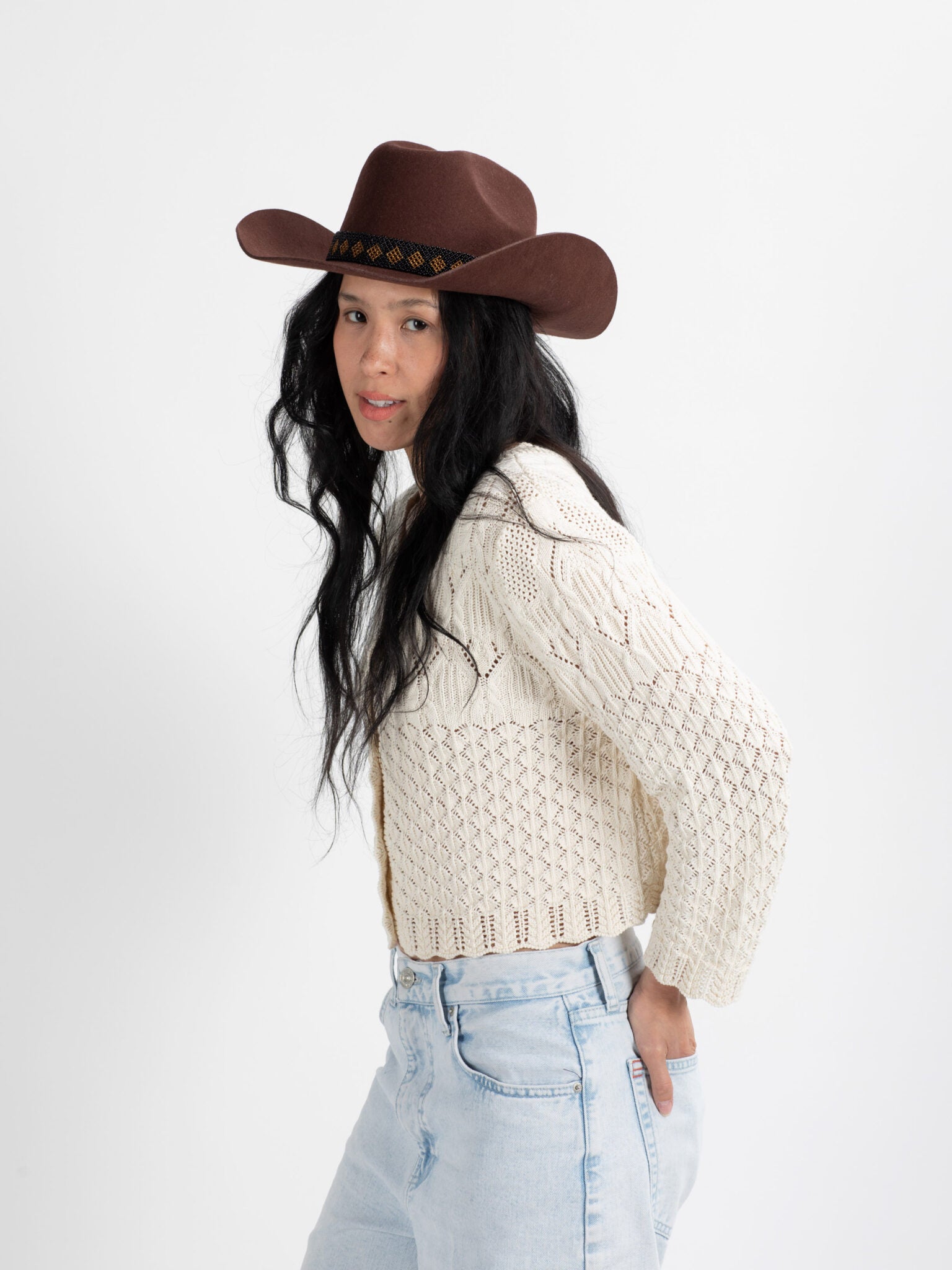 Woman wearing Kibuye handmade cowboy hat