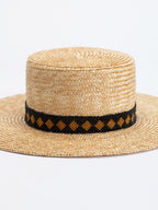 Close-up of Rwandan bead band on Kingston straw fedora crown