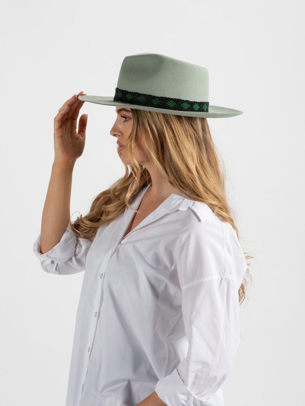 Woman wearing Kona handmade fedora hat