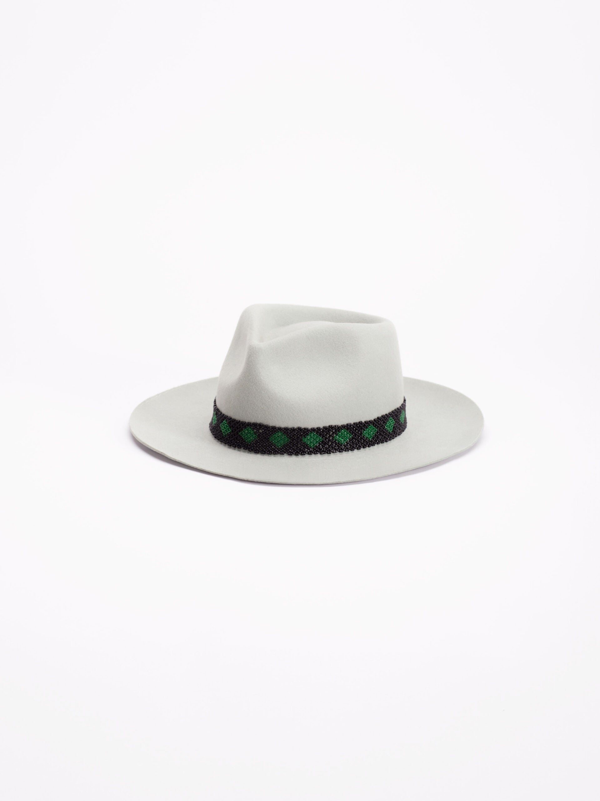 Kona handmade fedora hat in light wool with Rwandan beaded band, side view