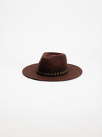 Tahoe handmade fedora hat in rich brown wool with Rwandan beaded band, side view